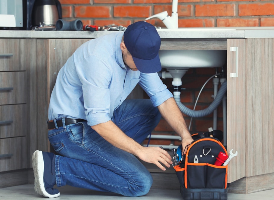 Professional Plumber Fixing Kitchen Sink - Plumbing Services In Lithgow, NSW