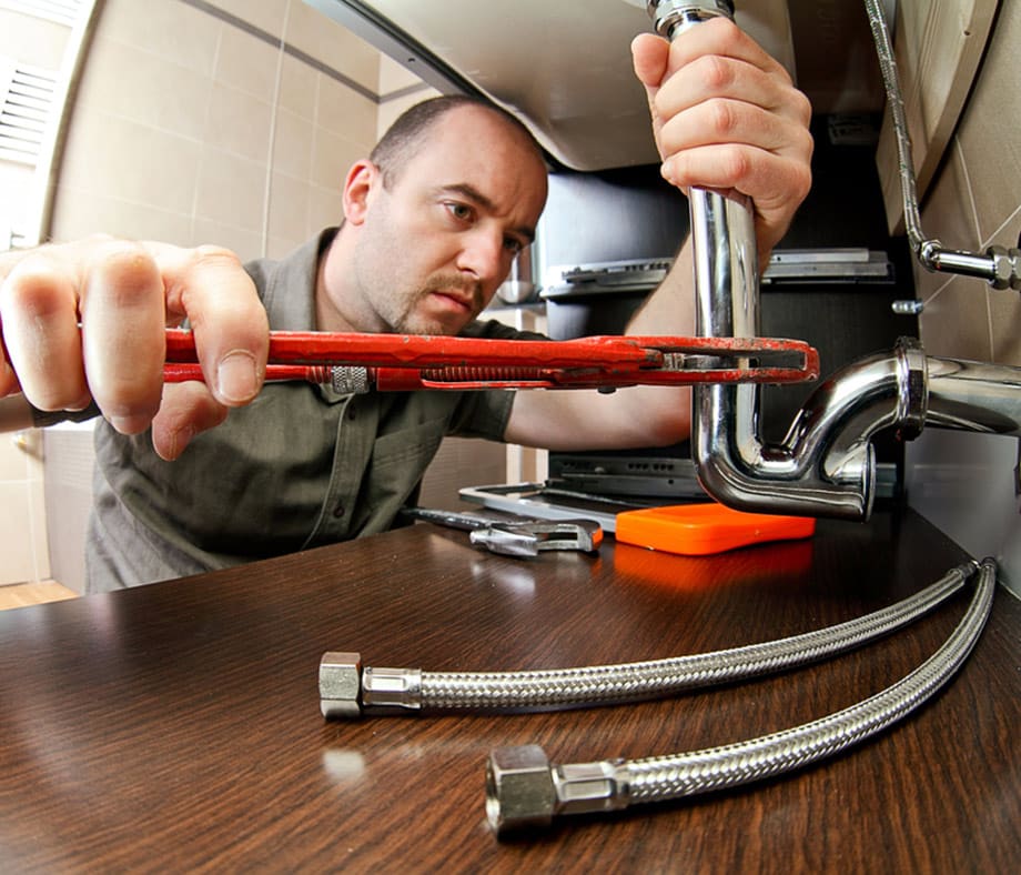 Plumber at Work Holding Wrench - Plumbing Services In Lithgow, NSW