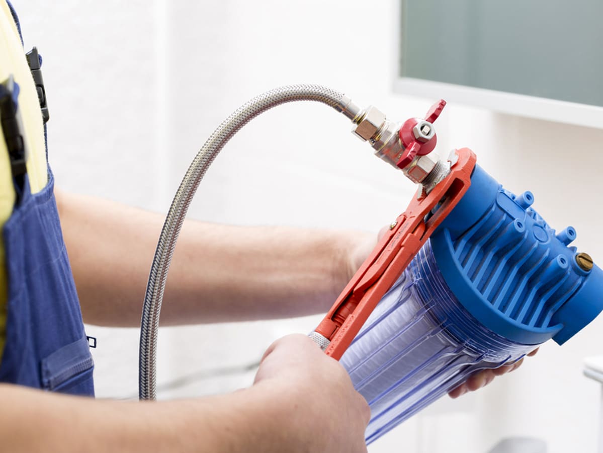 Plumber Installing New Water Filter in Bathroom - Emergency Plumbing Services In Lithgow, NSW