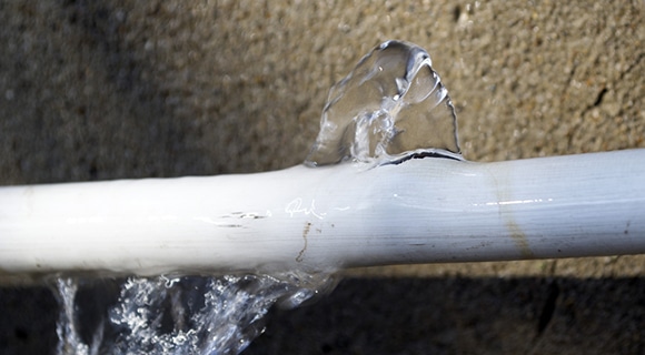 Water Burst in a White Cracked Pipe in Bathurst, NSW
