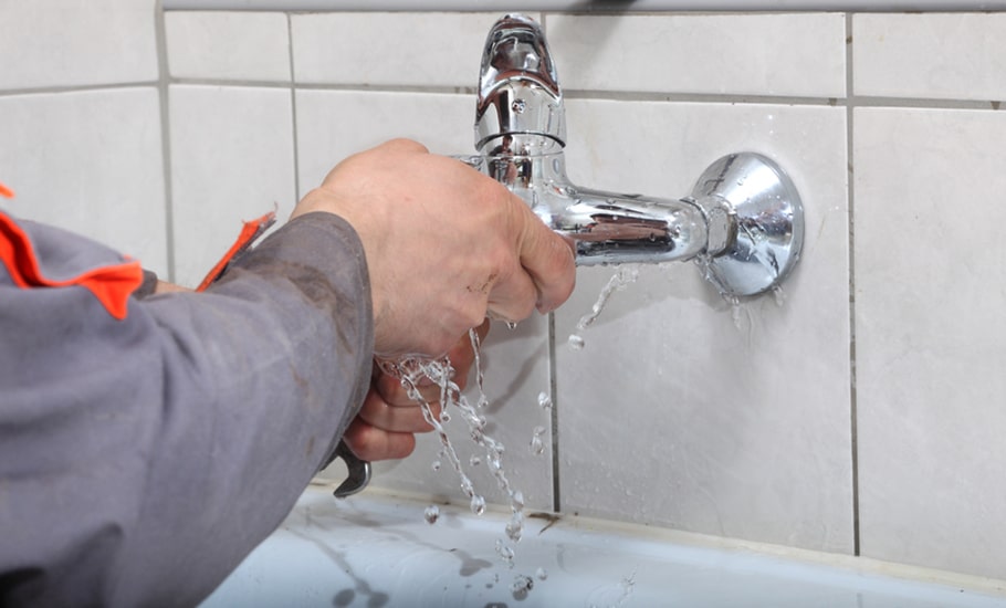 Plumber Fixing Water Tap With Leaking Water in Bathurst, NSW